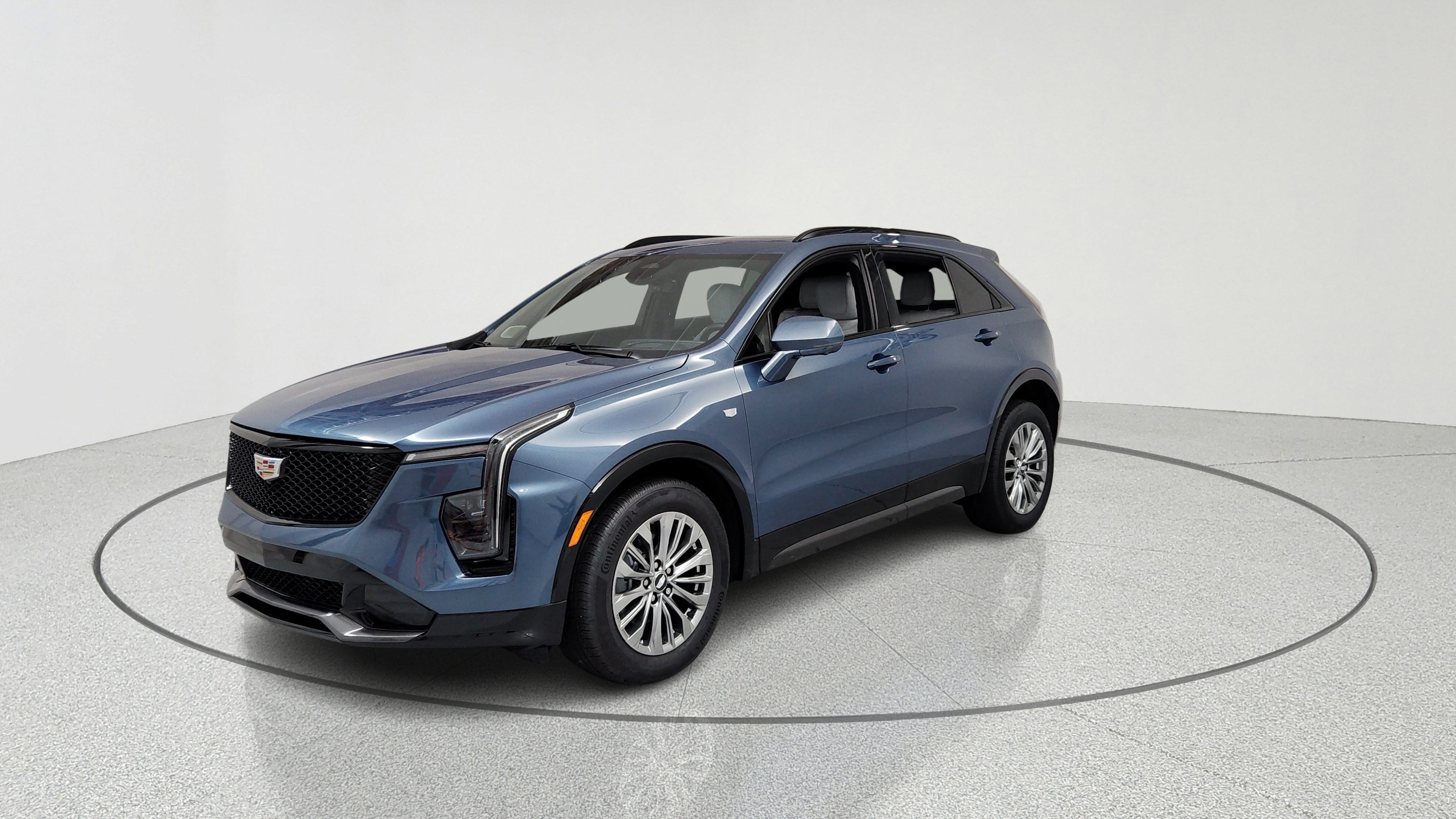 Learn About This Used 2025 Deep Sea Metallic Cadillac Sport XT4