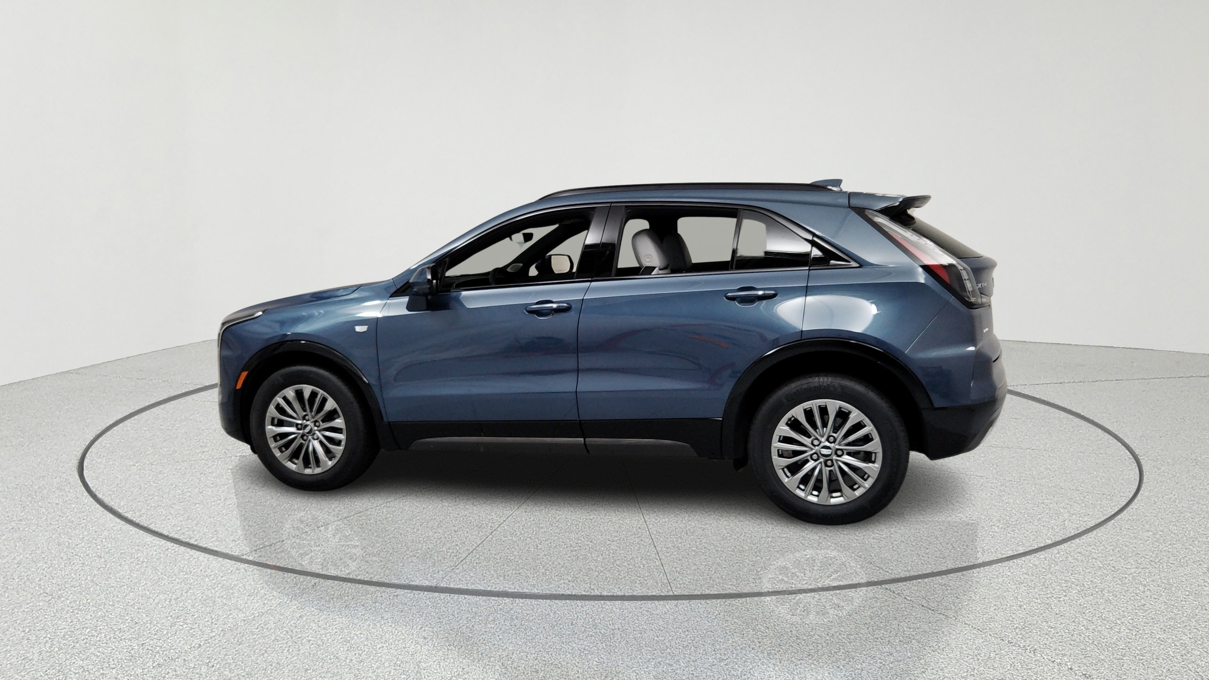 Learn About This Used 2025 Deep Sea Metallic Cadillac Sport XT4