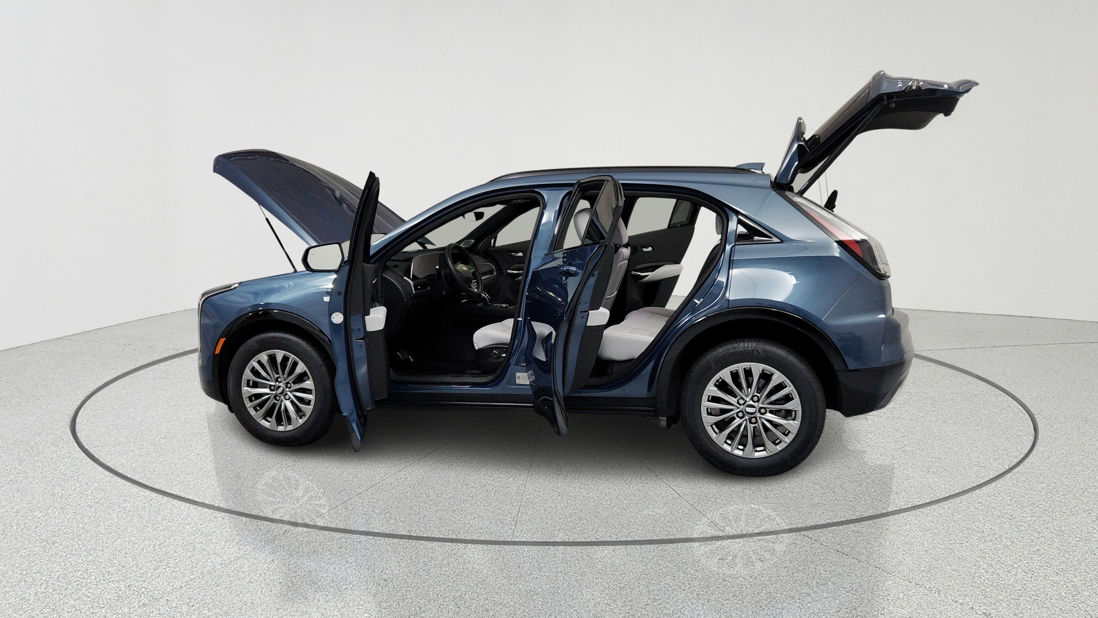 Learn About This Used 2025 Deep Sea Metallic Cadillac Sport XT4